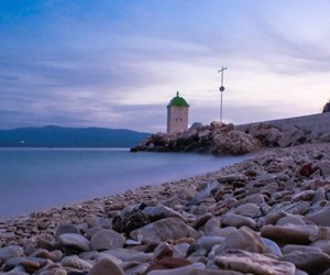 Beach and lighthouse at Bol town, Island of Brac