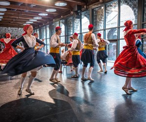 Lindjo folklore ensemble performing traditional dance