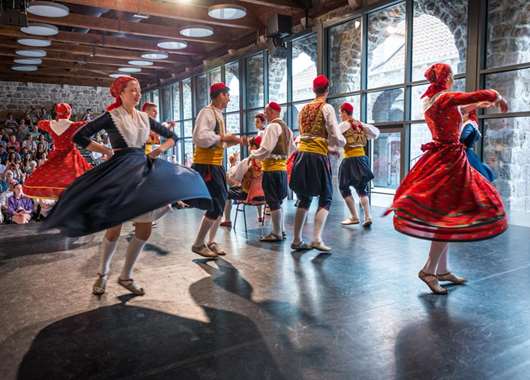 Lindjo folklore ensemble performing traditional dance