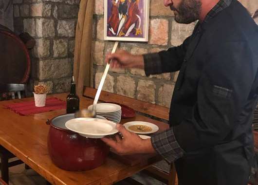 Niko serving the soup course