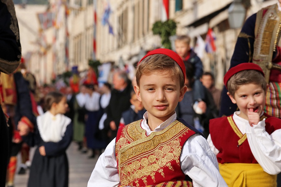 Feast of St. Blaise child in traditional costume